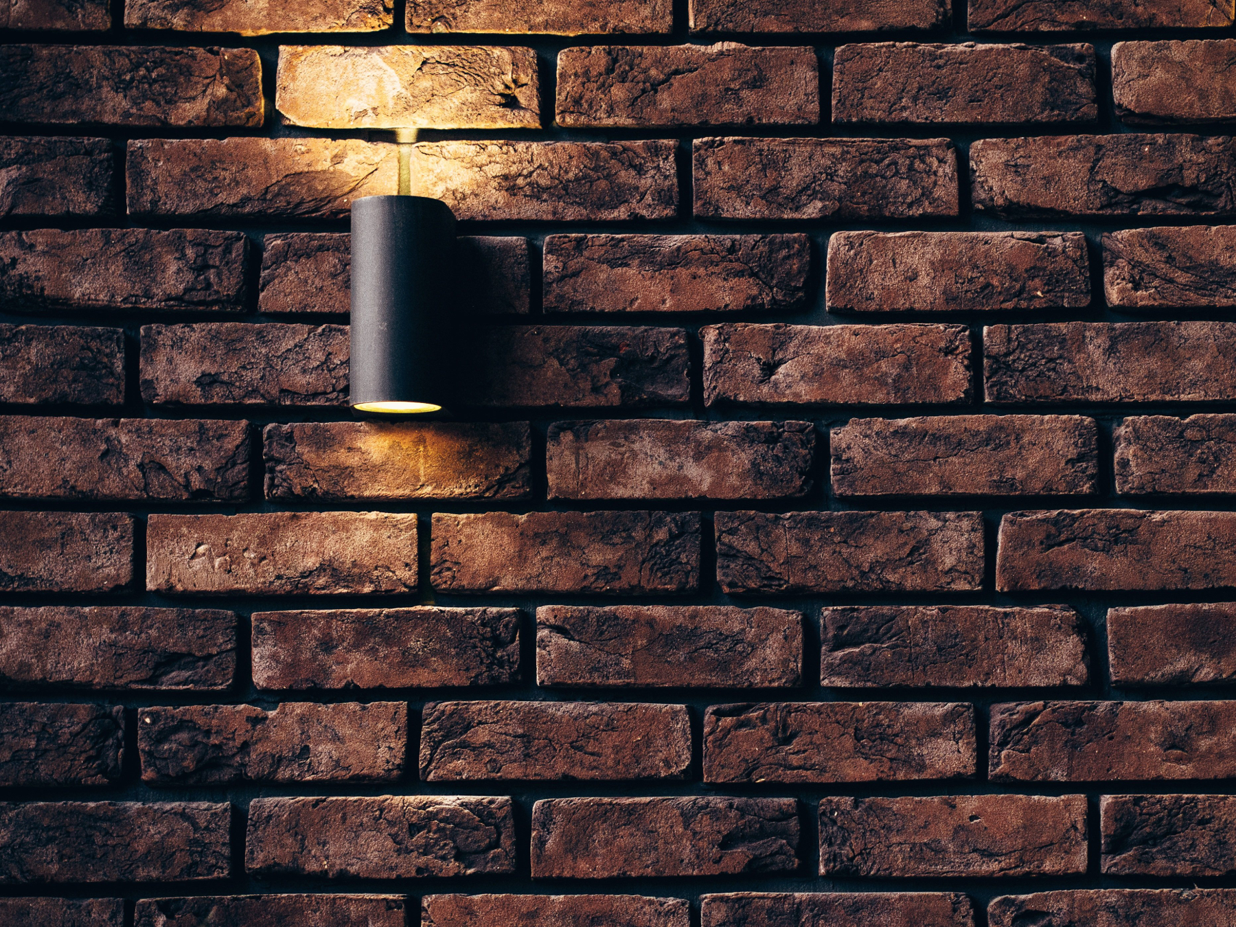 Wall light on brick wall