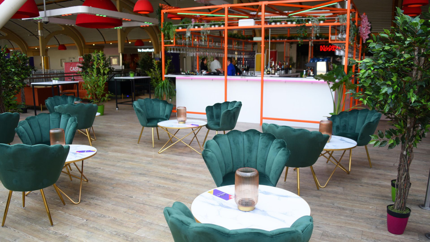 Seating area with the bar in the background