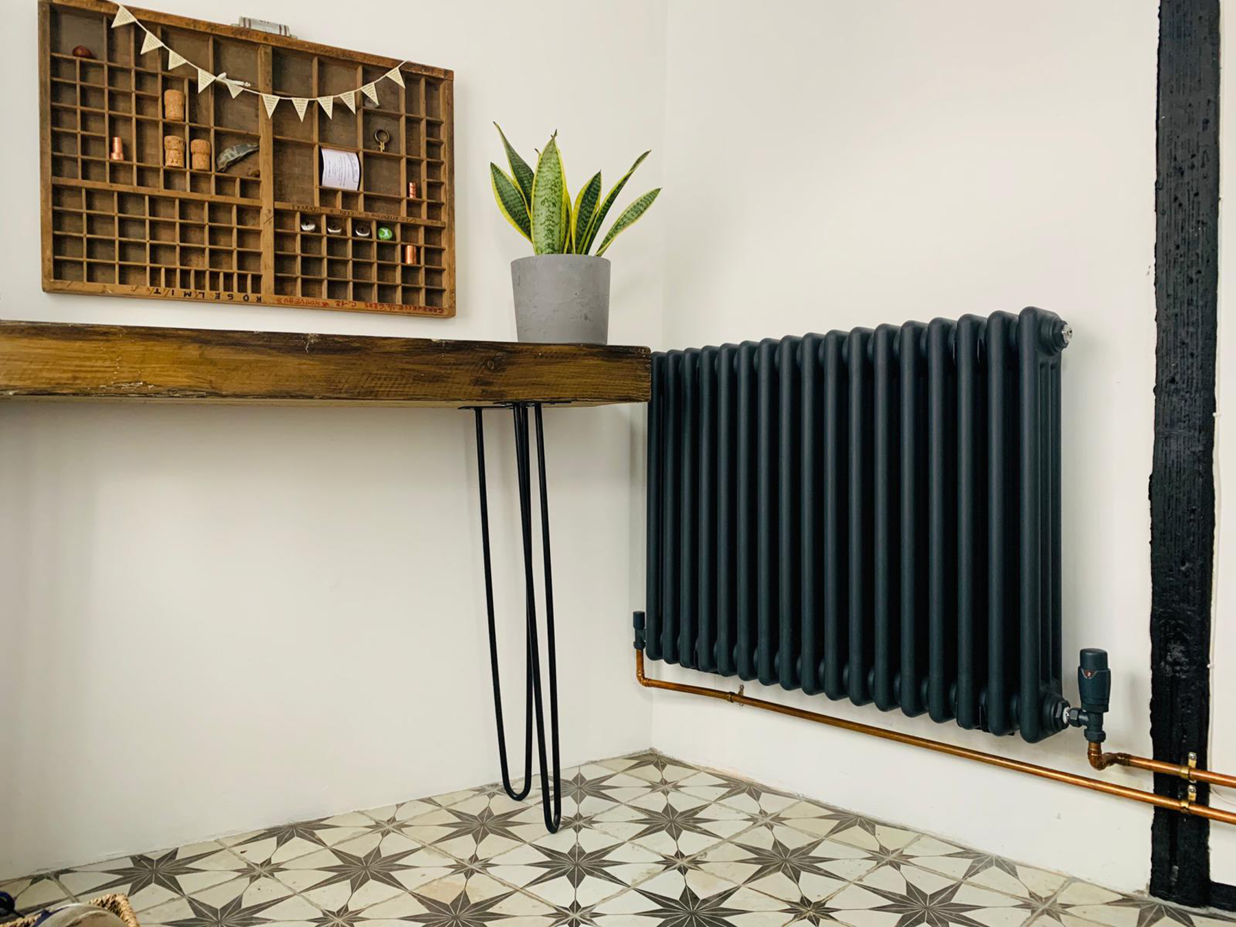 Traditional radiators used throughout to respect the character of the property