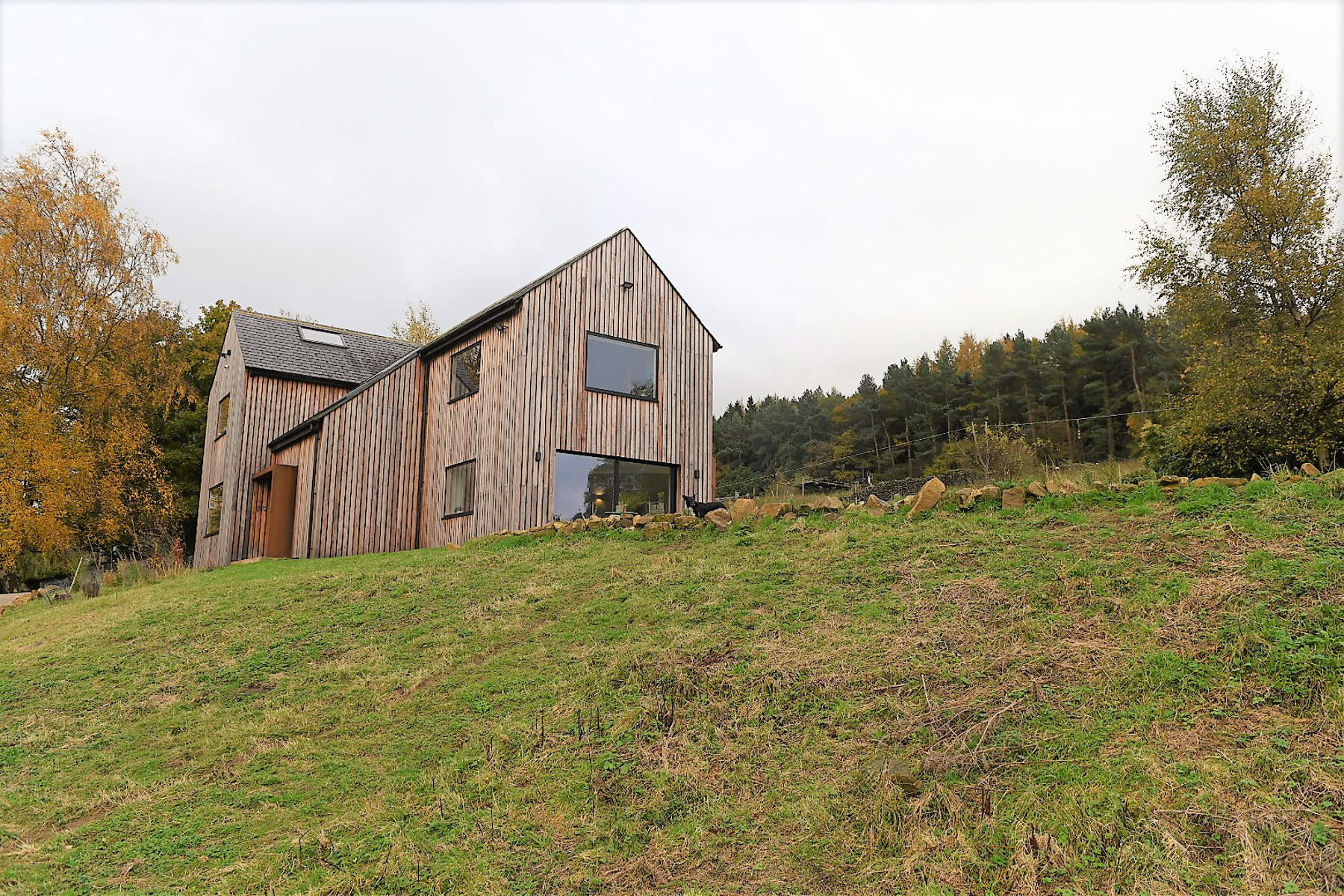 The property was reclad in scorched larch to give it a natural feel in this countryside setting