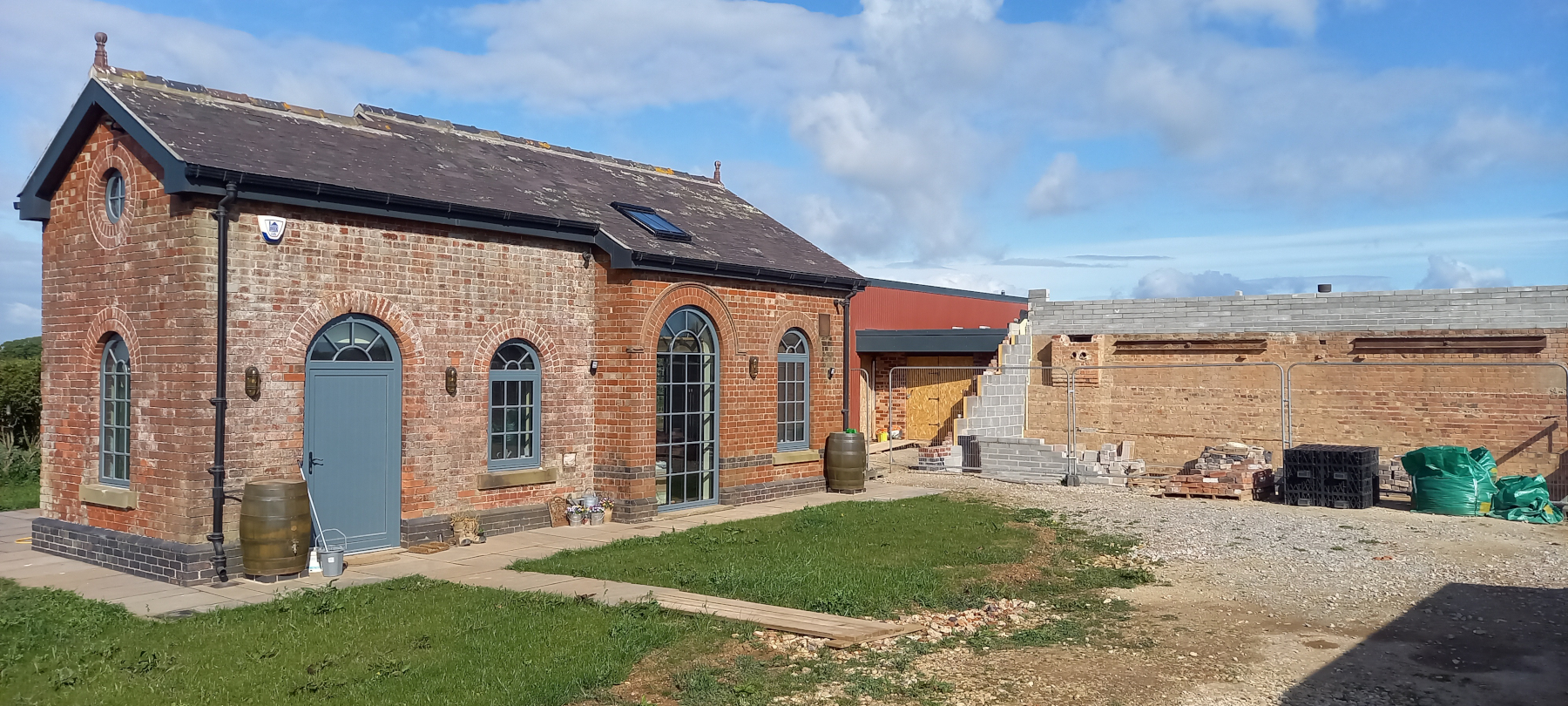 Site overview with pump house to the foreground (complete) and the reservoir to the rear (in progress)