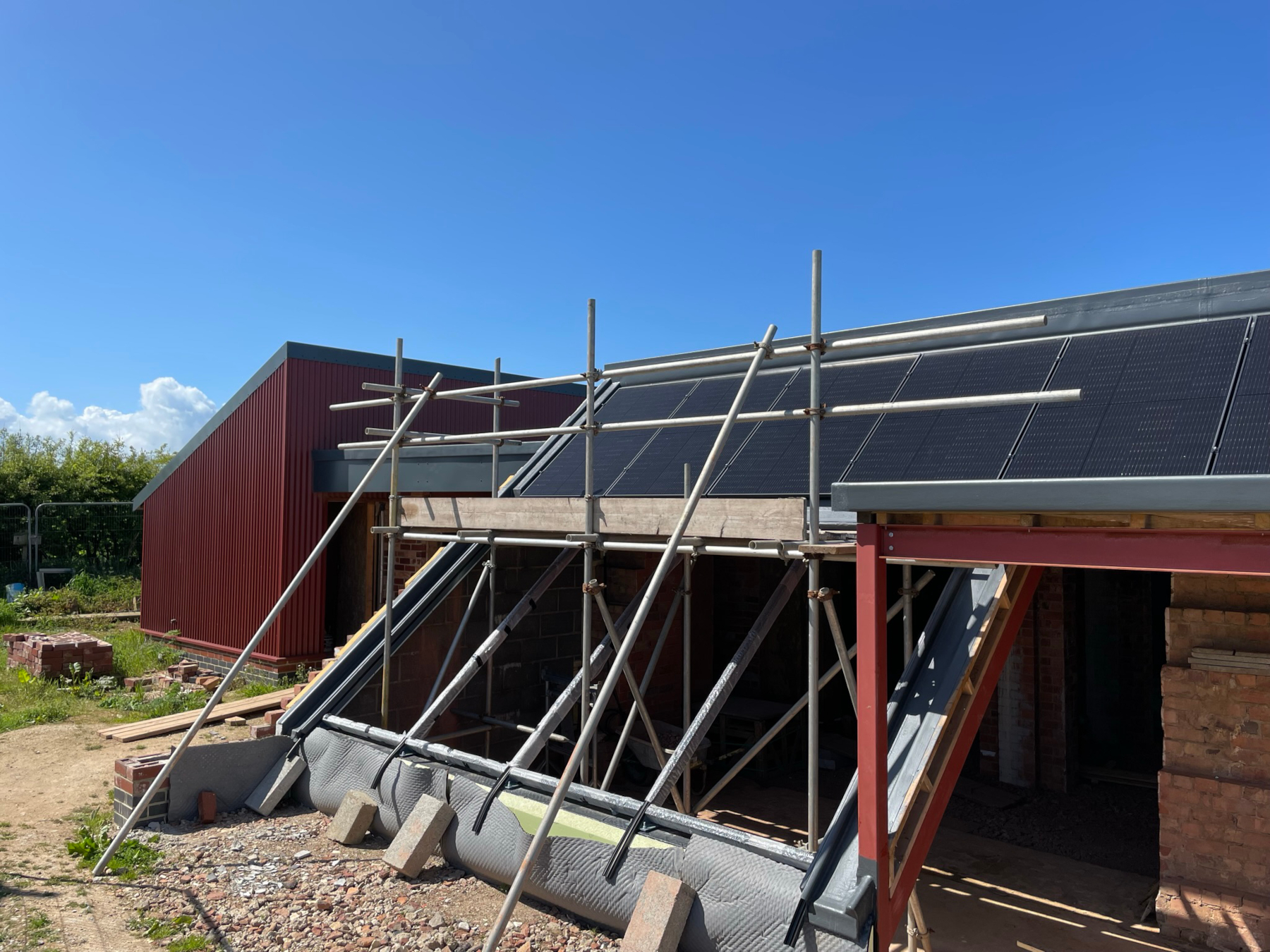 Steel frame and solar PV roof at ront of Reservoir prior to installation of glazing